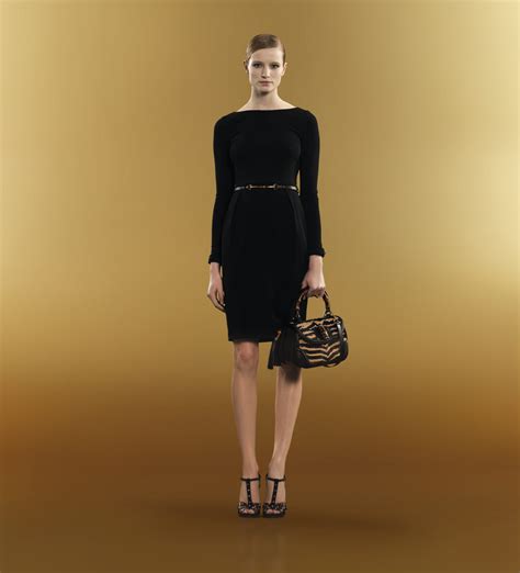 black gucci dress with belt